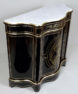 ebony and mahogany veneers, brass sheet marquetry, brass slats, repaired marble top, second half of the 19th century.