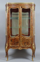 veneered with rosewood, gilded bronze fittings, brass strips, marble top, c. 1900.