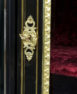 veneered with ebony and mahogany, brass and gilded bronze, marble top