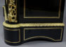 veneered with ebony and mahogany, brass and gilded bronze, marble top