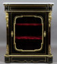 veneered with ebony and mahogany, brass and gilded bronze, marble top