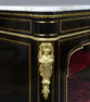 veneered with ebony and mahogany, brass and gilded bronze, marble top