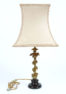 Gilded bronze, ceramic base, converted from a candlestick, electrically working, early 20th century.