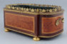 veneered with rosewood and walnut, brass handles and moldings with remnants of gilding, c. 1900.